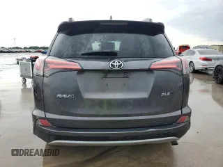 2018 Toyota RAV4 XLE with VIN 2T3WFREV6JW411935, listed as a Copart auction lot 54218405 with 123,831 mi miles and Salvage title. Bid and sale history available at DreamBid. Image 6.