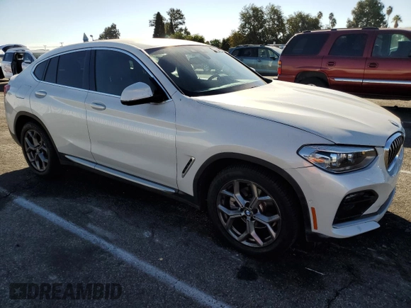 2020 BMW X4 xDrive30i with VIN 5UX2V1C09L9B97540, listed as a Copart auction lot 73984983 with 64,343 mi miles. Bid and sale history available at carsss.com. Image 4.