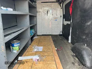 2021 Ford Transit Cargo with VIN 1FTBR1C83MKA20226, listed as a IAAI auction lot 42835281 with 53,381 mi miles and . Bid and sale history available at DreamBid. Image 4.