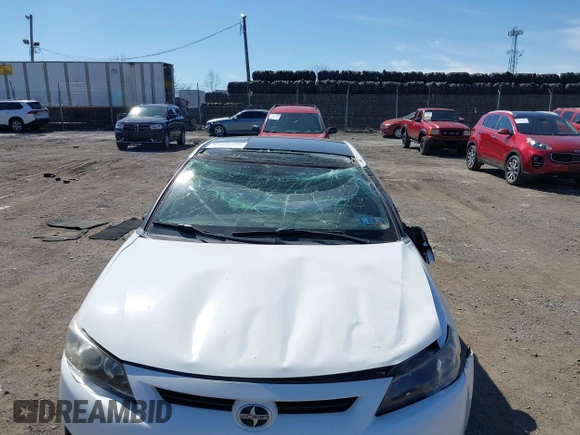 2012 Scion tC with VIN JTKJF5C7XC3029980, listed as a IAAI auction lot 41832490 with 132,140 mi miles. Bid and sale history available at carsss.com. Image 6.
