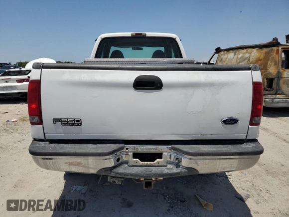 2000 Ford F-250 XL с VIN 1FTNX21F0YED32261, выставлен на аукционе Copart как лот 57243325 с пробегом 306 868 миль миль и Чистый • Clean title. История ставок и продаж доступна на DreamBid. Изображение 6.