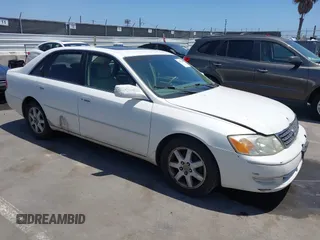 2003 Toyota Avalon XL z VIN 4T1BF28B23U306070, wystawiony jako IAAI lot #42517908 z przebiegiem 237 389 mil mil oraz . Historia ofert i sprzedaży dostępna na DreamBid. Obrazek 1.