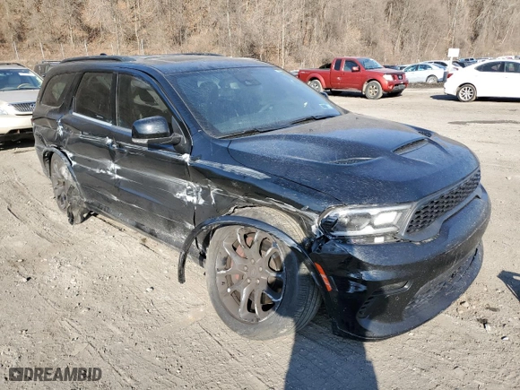 2023 Dodge Durango R/T Plus with VIN 1C4SDJCT3PC584041, listed as a Copart auction lot 42699595 with 20,357 mi miles and Salvage Title. Bid and sale history available at carsss.com. Image 4.
