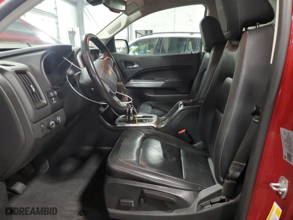 2021 Chevrolet Colorado 4WD ZR2 with VIN 1GCGTEEN7M1111894, listed as a Copart auction lot 85169404 with 56,965 mi miles and Salvage Title. Bid and sale history available at carsss.com. Image 7.