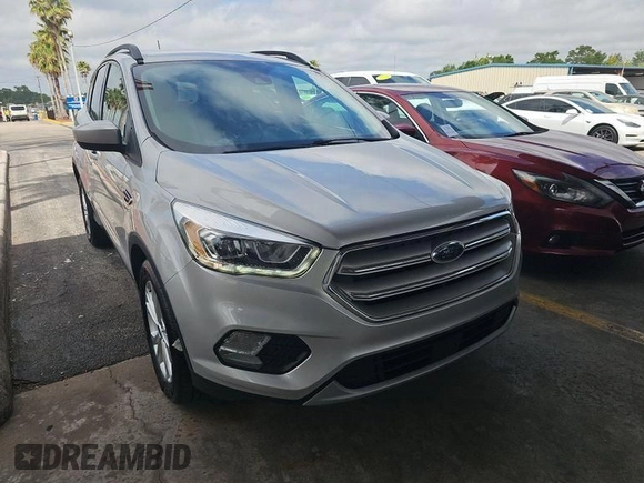 2018 Ford Escape SEL with VIN 1FMCU0HD2JUA75619, listed as a IAAI auction lot 41982029 with 60,456 mi miles and . Bid and sale history available at carsss.com. Image 1.