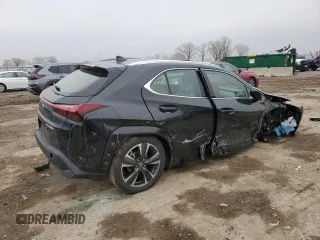 2025 Lexus UX with VIN JTHUCJDH5S2003058, listed as a Copart auction lot 43457505 with 1,239 mi miles and Salvage Title. Bid and sale history available at carsss.com. Image 3.