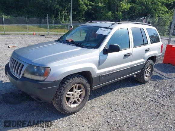 2004 Jeep Grand Cherokee Laredo with VIN 1J4GW48S84C116717, listed as a IAAI auction lot 42568586 with 228,233 mi miles and . Bid and sale history available at DreamBid. Image 2.