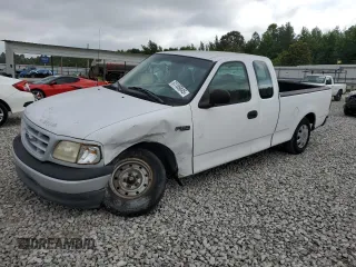 1999 Ford F-150 with VIN 1FTZX1728XNA67734, listed as a Copart auction lot 61195845 with Not provided miles and Salvage title. Bid and sale history available at DreamBid. Image 1.