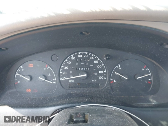 1997 Ford Ranger XLT z VIN 1FTCR10A4VTA44803, wystawiony jako IAAI lot #42479081 z przebiegiem 162 346 mil mil oraz . Historia ofert i sprzedaży dostępna na DreamBid. Obrazek 7.