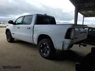 2019 Ram 1500 Rebel with VIN 1C6SRFLTXKN618849, listed as a Copart auction lot 50419595 with 98,219 mi miles and Salvage Title. Bid and sale history available at carsss.com. Image 2.