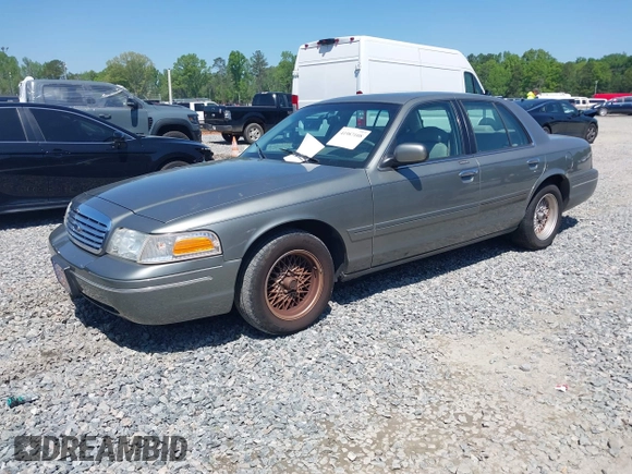 1999 Ford Crown Victoria LX с VIN 2FAFP74W8XX160853, выставлен на аукционе IAAI как лот 41987108 с пробегом 100 582 миль миль и . История ставок и продаж доступна на DreamBid. Изображение 2.