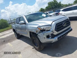 2023 Toyota Tacoma SR z VIN 3TYAX5GN0PT090132, wystawiony jako IAAI lot #42472501 z przebiegiem 28 979 mil mil oraz . Historia ofert i sprzedaży dostępna na DreamBid. Obrazek 1.