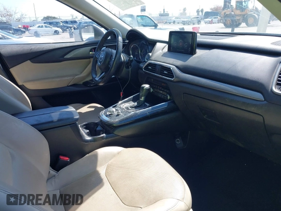 2019 Mazda CX-9 Touring with VIN JM3TCACY5K0306424, listed as a IAAI auction lot 42150466 with 95,166 mi miles and . Bid and sale history available at DreamBid. Image 5.