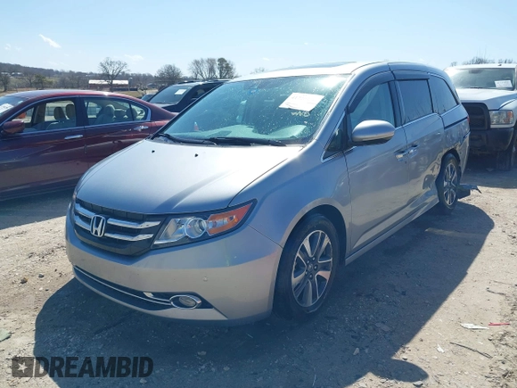 2016 Honda Odyssey Touring Elite with VIN 5FNRL5H96GB090653, listed as a IAAI auction lot 41720195 with 68,969 mi miles. Bid and sale history available at carsss.com. Image 17.