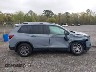 2024 Honda Passport TrailSport with VIN 5FNYF8H6XRB017735, listed as a IAAI auction lot 41931822 with 20,815 mi miles and . Bid and sale history available at DreamBid. Image 13.