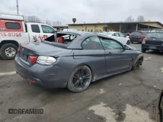 2015 BMW 4 Series 435i xDrive with VIN WBA3T7C56FP942328, listed as a Copart auction lot 52410695 with Not provided miles and Salvage title. Bid and sale history available at DreamBid. Image 3.