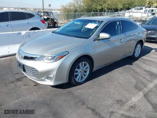 2014 Toyota Avalon Limited with VIN 4T1BK1EBXEU094015, listed as a IAAI auction lot 41415683 with 183,627 mi miles. Bid and sale history available at carsss.com. Image 2.
