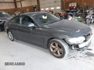 2015 BMW 4 Series 428i xDrive with VIN WBA3N9C57FK248296, listed as a IAAI auction lot 42421645 with 121,030 mi miles and . Bid and sale history available at DreamBid. Image 1.