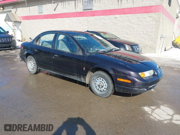 2000 Saturn SL z VIN 1G8ZH5280YZ223608, wystawiony jako IAAI lot #41377752 z przebiegiem 180 857 mil mil oraz . Historia ofert i sprzedaży dostępna na DreamBid. Obrazek 1.