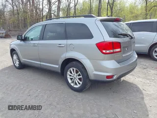 2015 Dodge Journey SXT with VIN 3C4PDDBG4FT554643, listed as a IAAI auction lot 42172378 with 144,924 mi miles and . Bid and sale history available at DreamBid. Image 3.