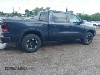 2019 Ram 1500 Rebel z VIN 1C6SRFLT1KN784936, wystawiony jako IAAI lot #42375986 z przebiegiem 78 539 mil mil oraz . Historia ofert i sprzedaży dostępna na DreamBid. Obrazek 4.