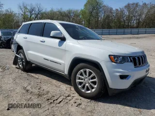 2022 Jeep Grand Cherokee Laredo X with VIN 1C4RJEAG1NC155952, listed as a Copart auction lot 52170235 with 74,695 mi miles and Salvage title. Bid and sale history available at DreamBid. Image 4.