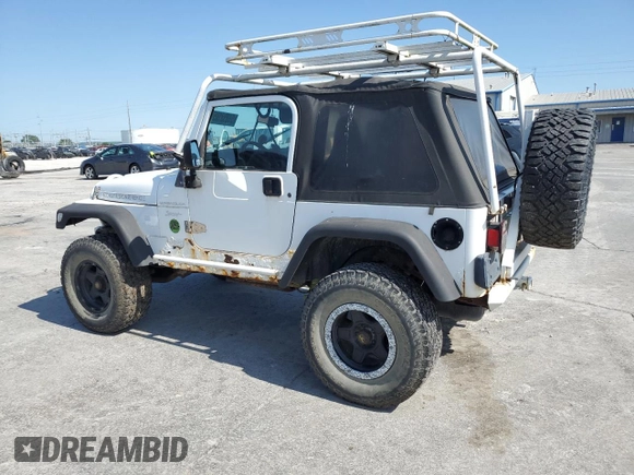 1999 Jeep Wrangler Sport with VIN 1J4FY19SXXP464096, listed as a Copart auction lot 61233105 with 167,350 mi miles and Clean title. Bid and sale history available at DreamBid. Image 2.