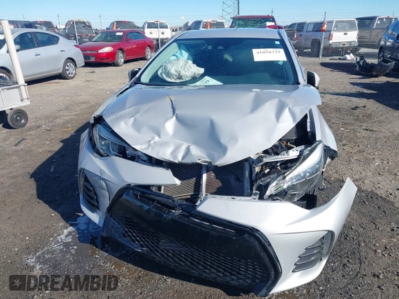 2017 Toyota Corolla L with VIN 5YFBURHE3HP689955, listed as a IAAI auction lot 41858329 with 126,611 mi miles and . Bid and sale history available at DreamBid. Image 6.