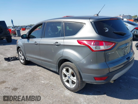 2014 Ford Escape SE with VIN 1FMCU9G97EUD86213, listed as a IAAI auction lot 40515507 with 129,711 mi miles and . Bid and sale history available at carsss.com. Image 3.