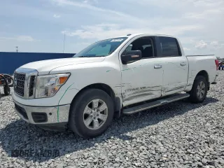2018 Nissan Titan SV z VIN 1N6AA1E63JN551464, wystawiony jako Copart lot #55825435 z przebiegiem 152 261 mil mil oraz Szkoda całkowita • Salvage title. Historia ofert i sprzedaży dostępna na DreamBid. Obrazek 1.