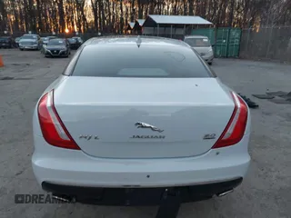 2017 Jaguar XJ with VIN SAJWJ2GD5H8W08395, listed as a IAAI auction lot 41014883 with 80,584 mi miles. Bid and sale history available at carsss.com. Image 16.