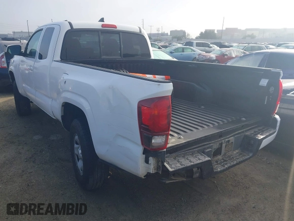 2019 Toyota Tacoma SR with VIN 5TFSX5EN0KX066774, listed as a IAAI auction lot 41534797 with 153,172 mi miles and . Bid and sale history available at DreamBid. Image 3.