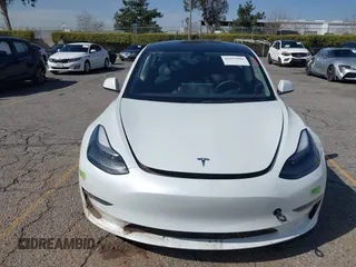 2023 Tesla Model 3 with VIN 5YJ3E1EA8PF398110, listed as a IAAI auction lot 41692006 with 112,699 mi miles and . Bid and sale history available at carsss.com. Image 12.