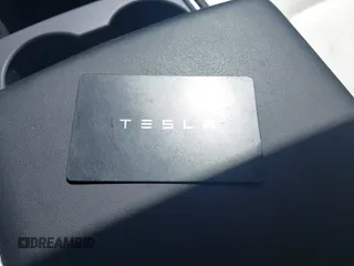 2023 Tesla Model 3 with VIN 5YJ3E1EAXPF617388, listed as a IAAI auction lot 42218748 with Not provided miles and . Bid and sale history available at DreamBid. Image 11.