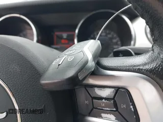 2016 Ford Mustang EcoBoost Premium z VIN 1FATP8UH4G5221806, wystawiony jako IAAI lot #42145462 z przebiegiem 116 223 mil mil oraz . Historia ofert i sprzedaży dostępna na DreamBid. Obrazek 11.