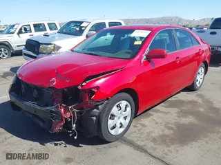 2007 Toyota Camry CE with VIN 4T1BE46K57U111765, listed as a IAAI auction lot 42058314 with 193,972 mi miles. Bid and sale history available at carsss.com. Image 18.