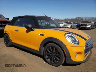 2017 MINI Convertible Cooper with VIN WMWWG5C31H3D00262, listed as a Copart auction lot 49154475 with 130,973 mi miles and Salvage title. Bid and sale history available at DreamBid. Image 4.