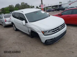 2018 Volkswagen Atlas SE with VIN 1V2DP2CAXJC599632, listed as a IAAI auction lot 41523224 with 149,318 mi miles and . Bid and sale history available at DreamBid. Image 1.