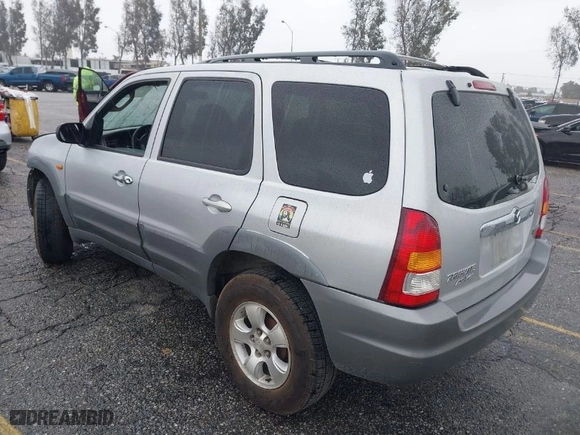 2001 Mazda Tribute LX with VIN 4F2YU09151KM22080, listed as a IAAI auction lot 41549617 with 164,975 mi miles. Bid and sale history available at carsss.com. Image 3.