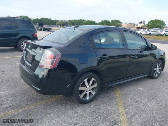 2011 Nissan Sentra 2.0 SR with VIN 3N1AB6AP6BL702894, listed as a IAAI auction lot 41989956 with 114,420 mi miles. Bid and sale history available at carsss.com. Image 4.