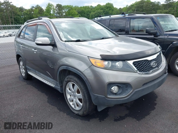 2012 Kia Sorento LX with VIN 5XYKT3A60CG285902, listed as a IAAI auction lot 42142043 with 225,206 mi miles and . Bid and sale history available at carsss.com. Image 1.