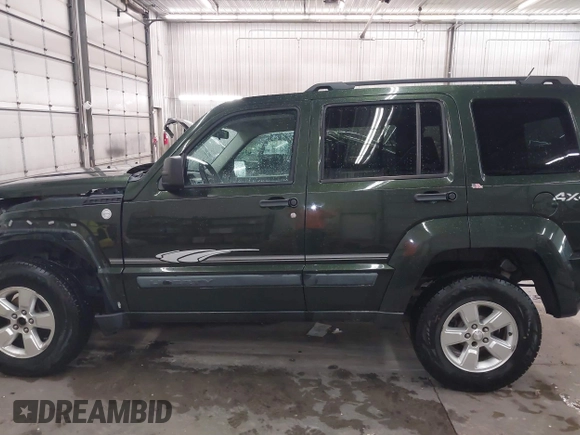 2010 Jeep Liberty Sport with VIN 1J4PN2GKXAW166781, listed as a IAAI auction lot 42301262 with 117,798 mi miles and . Bid and sale history available at DreamBid. Image 15.