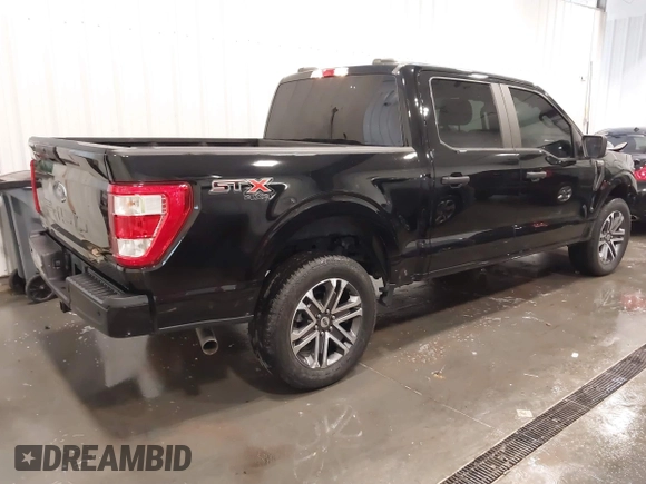 2021 Ford F-150 XL with VIN 1FTFW1E51MFD11166, listed as a IAAI auction lot 41883197 with 33,303 mi miles. Bid and sale history available at carsss.com. Image 4.
