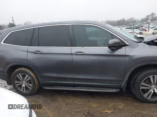 2017 Honda Pilot EX-L with VIN 5FNYF5H8XHB018480, listed as a IAAI auction lot 41049028 with 136,748 mi miles and . Bid and sale history available at DreamBid. Image 14.