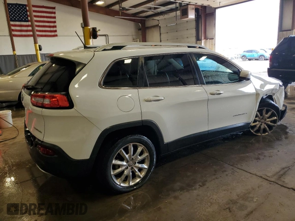 2015 Jeep Cherokee Limited with VIN 1C4PJLDBXFW765909, listed as a Copart auction lot 52293525 with 125,702 mi miles and Salvage Title. Bid and sale history available at DreamBid. Image 3.