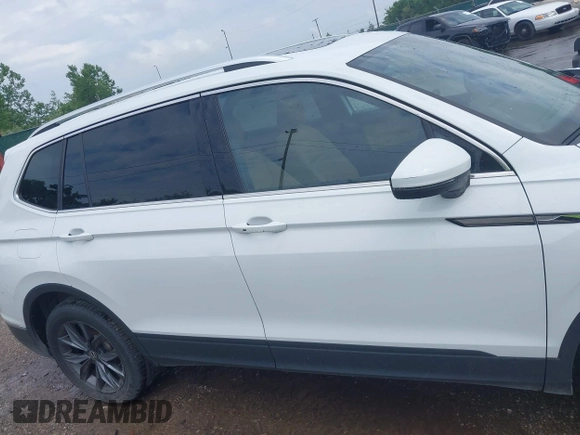 2022 Volkswagen Tiguan SE z VIN 3VV2B7AX0NM079702, wystawiony jako IAAI lot #42600950 z przebiegiem 91 826 mil mil oraz . Historia ofert i sprzedaży dostępna na DreamBid. Obrazek 13.