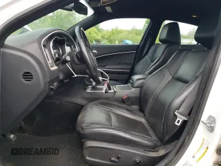 2015 Dodge Charger SXT with VIN 2C3CDXHG4FH832400, listed as a Copart auction lot 61493795 with 134,582 mi miles and Salvage title. Bid and sale history available at DreamBid. Image 7.
