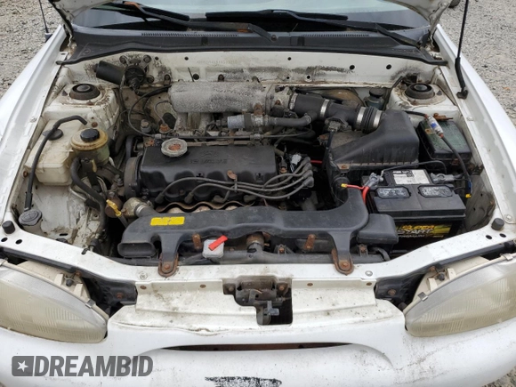 1999 Hyundai Accent with VIN KMHVD14N9XU503210, listed as a Copart auction lot 56486325 with 195,501 mi miles and Salvage title. Bid and sale history available at DreamBid. Image 11.