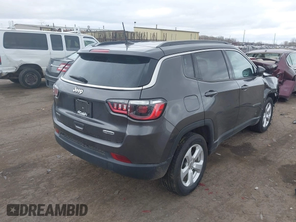 2021 Jeep Compass Latitude with VIN 3C4NJDBBXMT551702, listed as a IAAI auction lot 42045266 with 67,882 mi miles and . Bid and sale history available at DreamBid. Image 4.