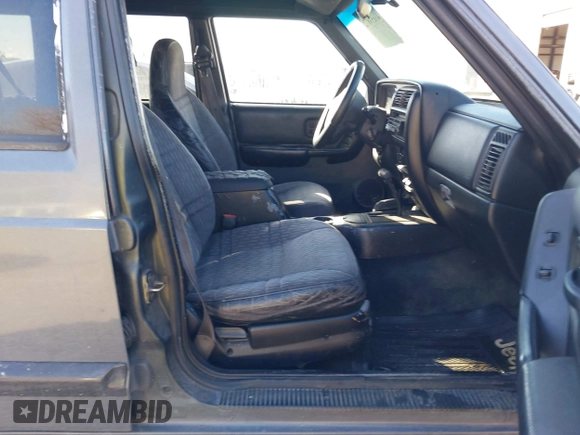 1997 Jeep Cherokee Sport with VIN 1J4FJ68S4VL567490, listed as a IAAI auction lot 41659872 with 404,766 mi miles. Bid and sale history available at carsss.com. Image 5.